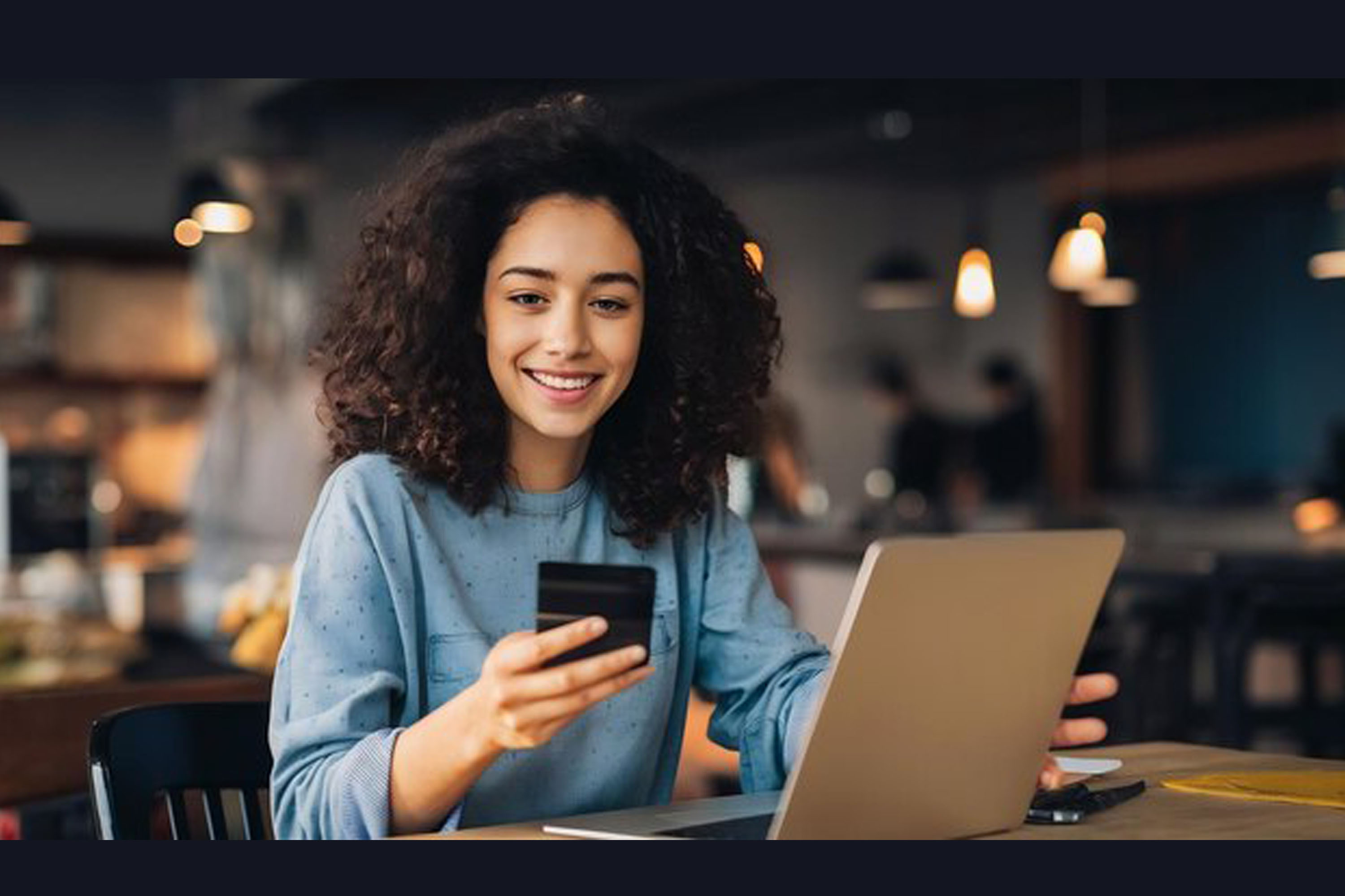 A woman reviewing her business finances on a tablet